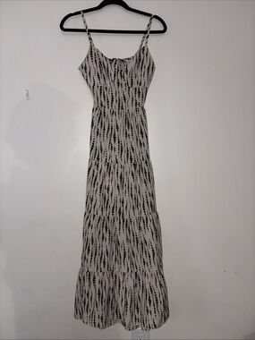 Spaghetti Strap,
Open back, Maxi Dress in Beige and Black Print